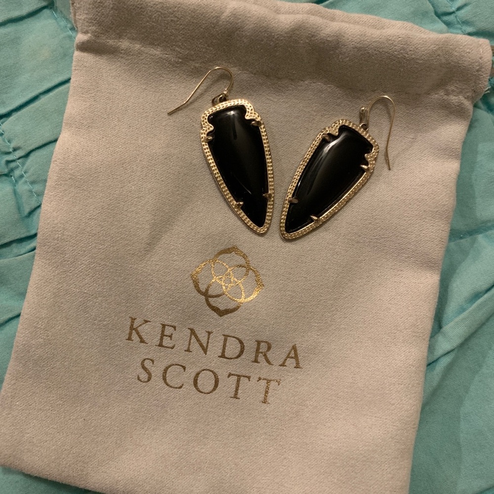 Black Kendra Scott earrings with gold trim